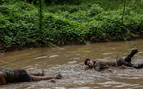U.S. and Philippine Marines overcome jungle obstacles