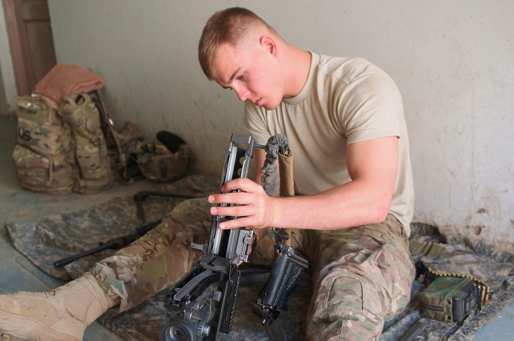 Pfc. Christopher Alexander, slugger gunner