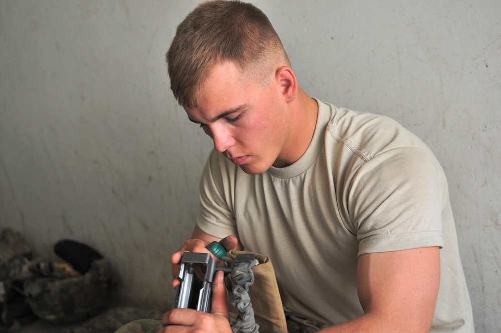 Pfc. Christopher Alexander, slugger gunner