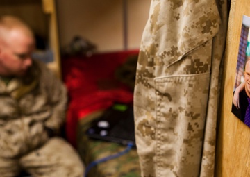 A world apart: Deployed father watches daughter’s first moments