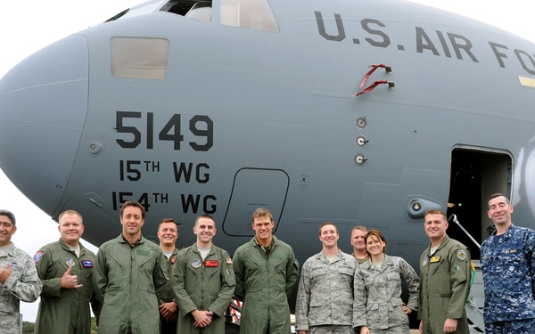 'Hawaii Five-0' films aboard a Hickam C-17