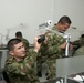 SCARNG maintenance soldiers work with the Colombian army maintenance personnel
