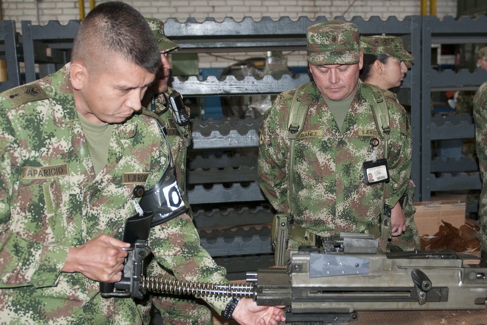 Colombia soldiers work on MK19s