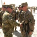 IJC commander visits ‘Black Jack,’ reenlists, coins Soldiers