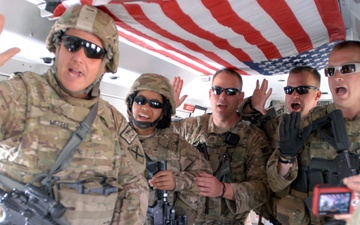 Soldiers fly to reenlist