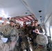 Soldiers fly to reenlist