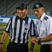 Lt. Gen. Robert L. Caslen Jr. discusses a call with a referee at Cotton Bowl Stadium