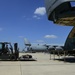 The 433 AMS and 356 AS work together to load a C-5A Galaxy