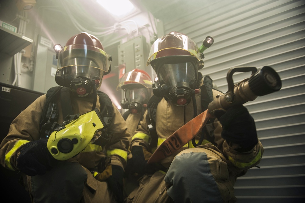 USS Harry S. Truman sailors conduct firefighting drills