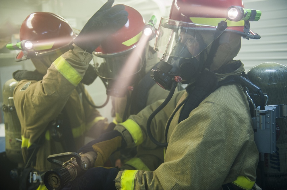 USS Harry S. Truman sailors conduct firefighting drills