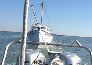 Coast Guard rescues 2 boaters aboard sinking boat near Crisfield, Md.