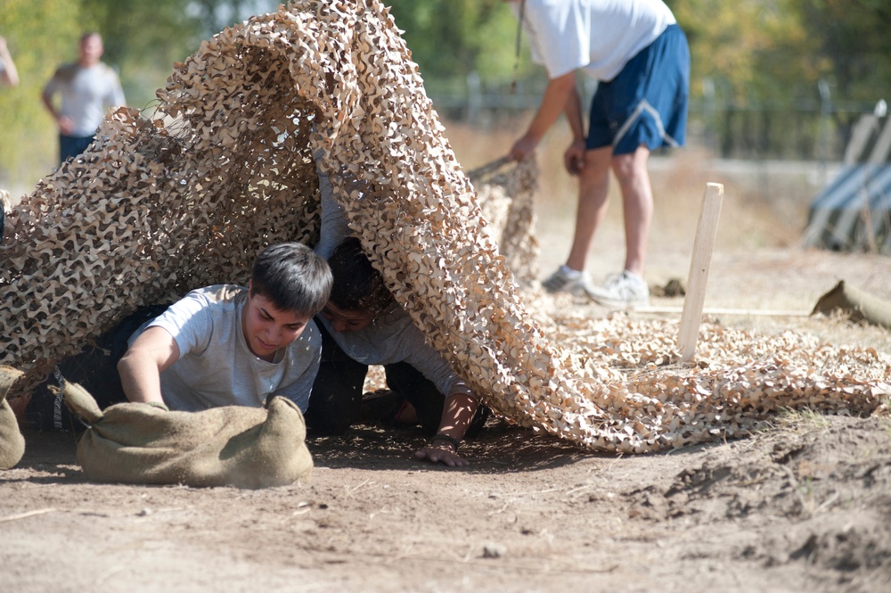 Service members get dirty for a good cause