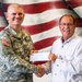Local business presents donation to ND National Guard Emergency Relief Fund