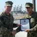 VADM John Miller views CTF 56 assets.