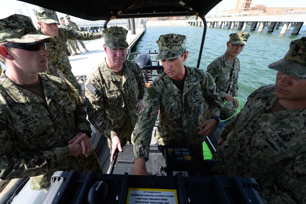 VADM John Miller views CTF 56 assets.