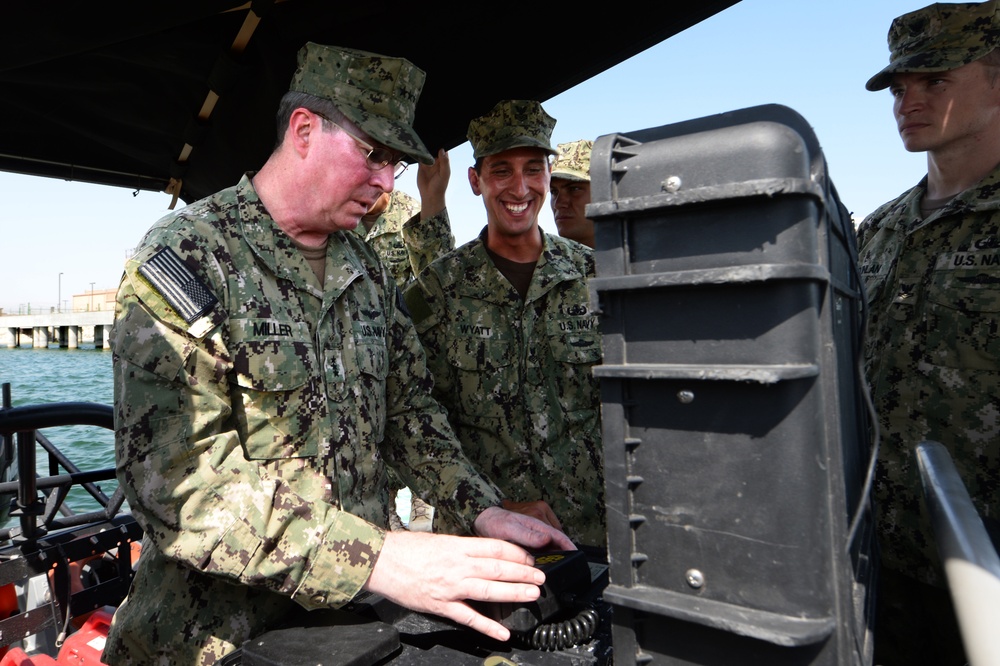 VADM John Miller views CTF 56 assets.