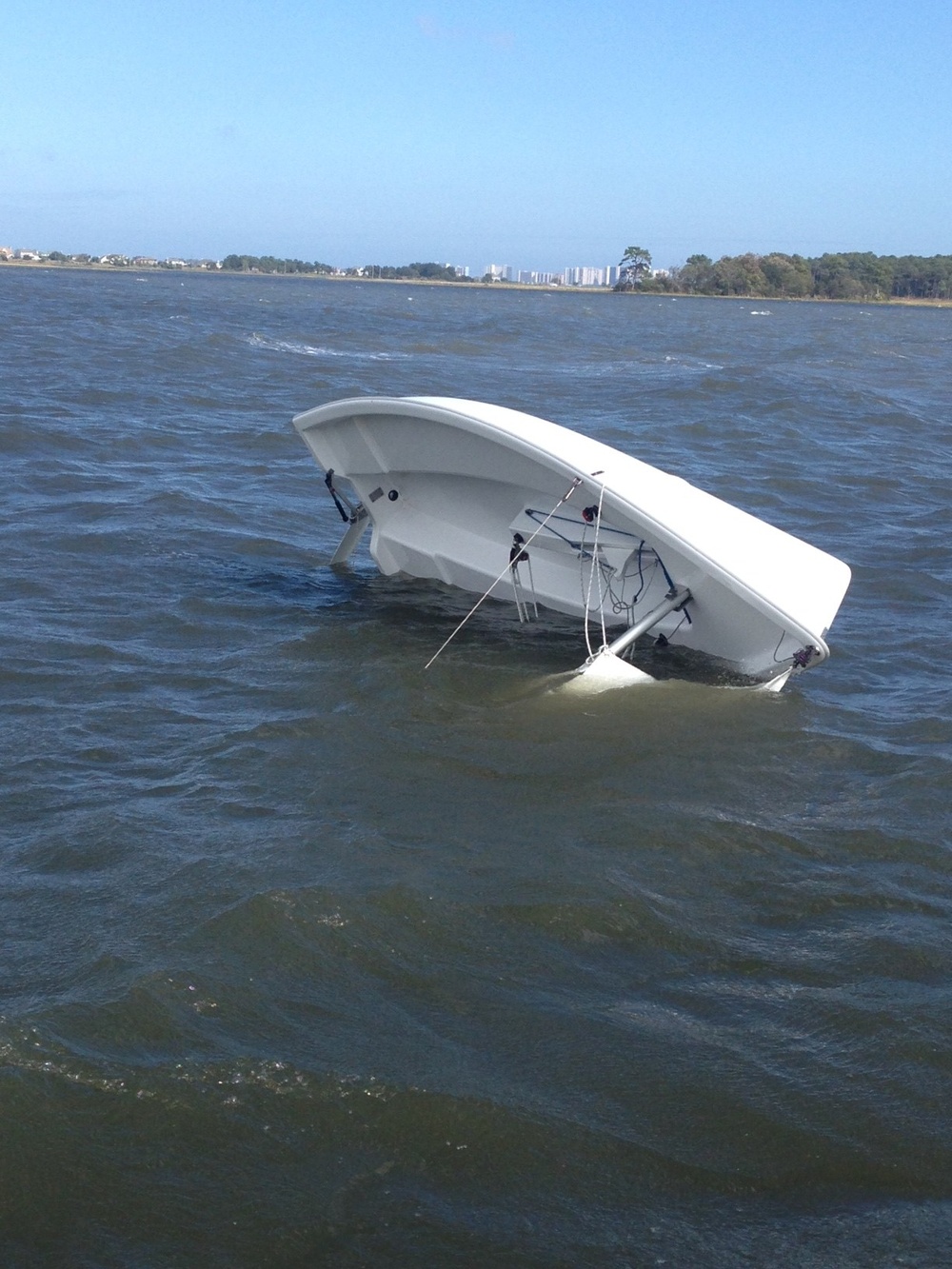 Coast Guard rescues 2 boaters from capsized sailboat near Ocean City, Md.