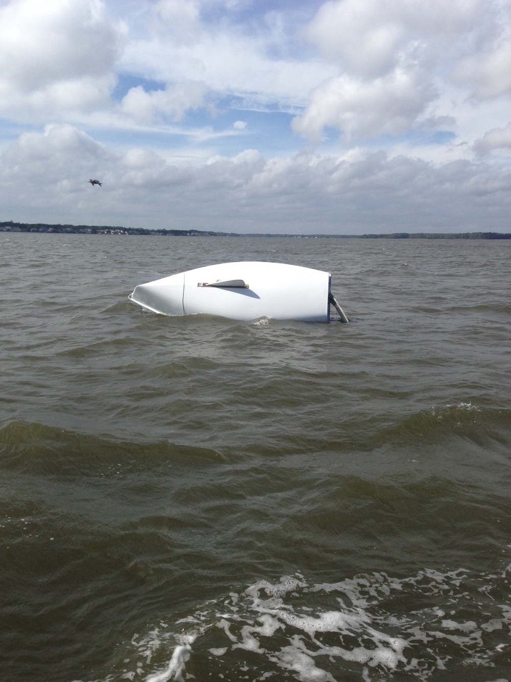 Coast Guard rescues 2 boaters from capsized sailboat near Ocean City, Md.