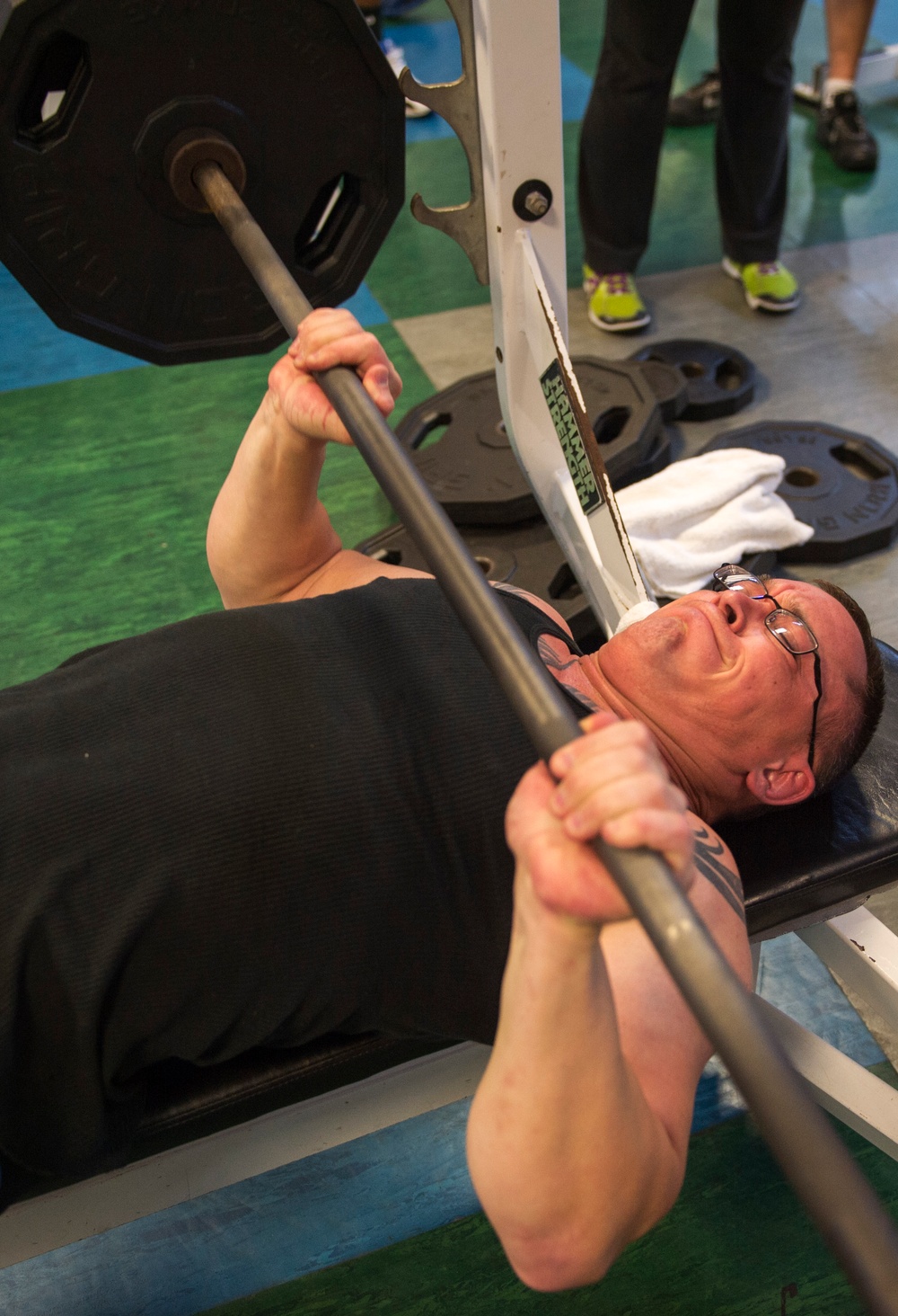 Bench press competition at the wearhouse gym on Naval Air Station North Island.