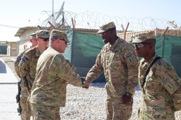 IJC commander awards coin to Staff Sgt. Fastin