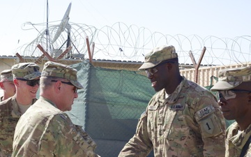 IJC commander awards coin to Staff Sgt. Fastin