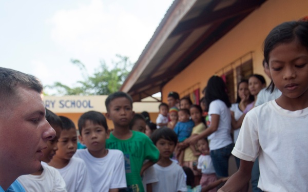 Military service members entertain communities