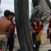 Coast Guard responds to 4 people on flooding boat