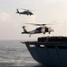 MH-60S Sea Hawk helicopters prepare to lift cargo