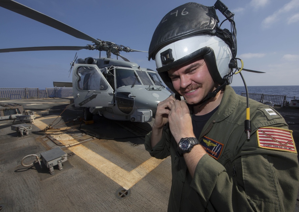 Preflight inspection of an MH-60R Seahawk helicopter