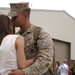 Marines embrace their friends and families after a long deployment