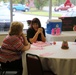Breast cancer survivors put on pink; Annual luncheon celebrates awareness month