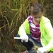 Station residents take time to harvest rice