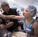 Serving Country and Community: Marines volunteer to package crisis relief meals at Aurora United Methodist Church
