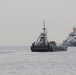Coast Guard, Navy remove buoy from beach