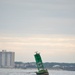 Coast Guard, Navy retrieve aground buoy from Chic's Beach, Va.