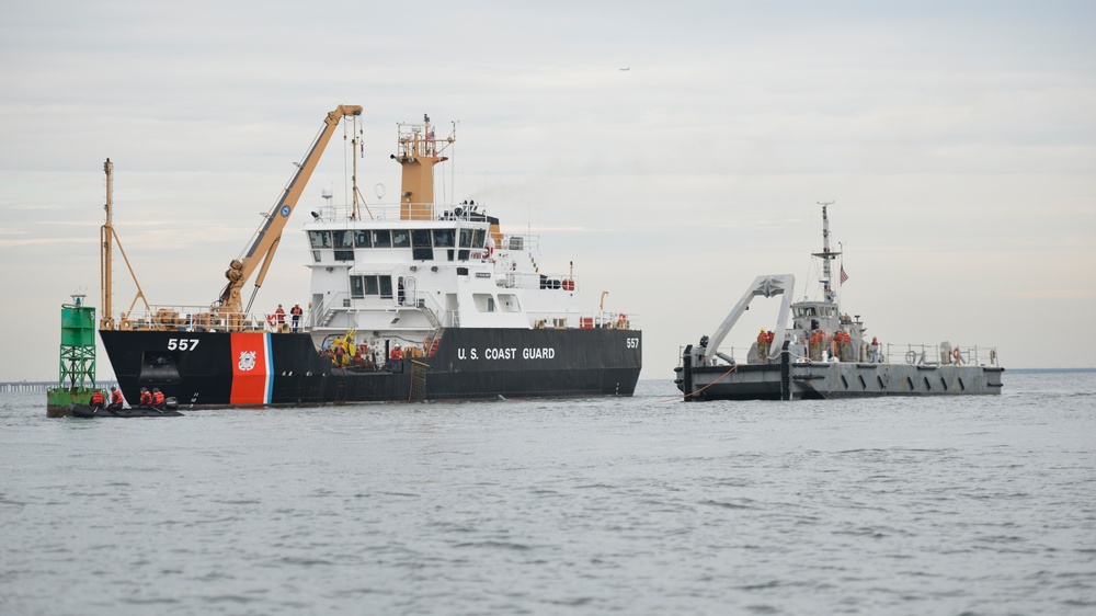 Coast Guard, Navy remove aground buoy from Chic's Beach, Va.