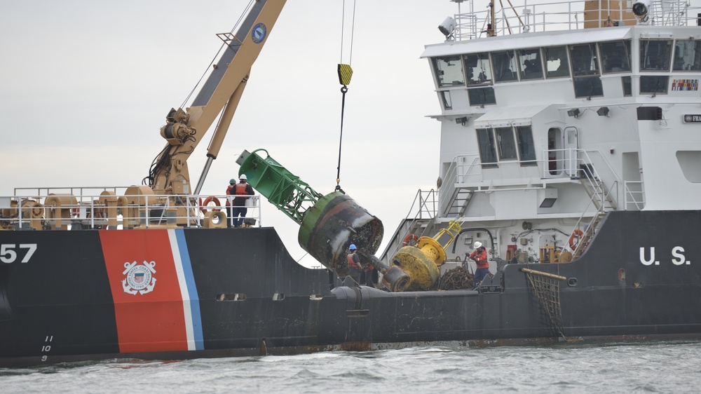 Coast Guard, Navy remove aground buoy from Chic's Beach, Va.