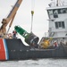 Coast Guard, Navy remove aground buoy from Chic's Beach, Va.