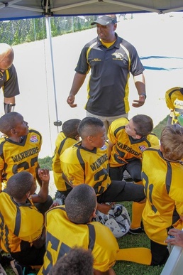 Ironhorse soldier uses Army skills to train young football stars