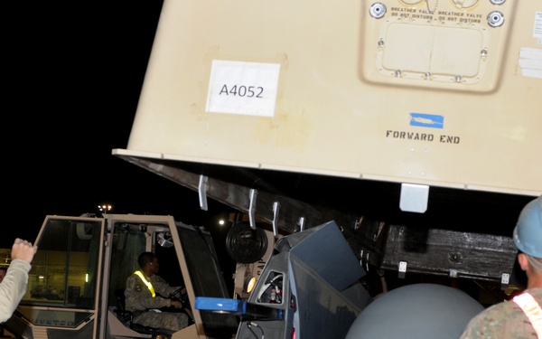 MQ-9 Airmen unload aircraft