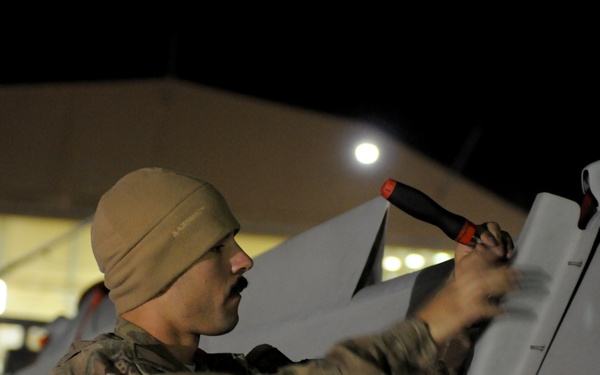 MQ-9 Airmen unload aircraft