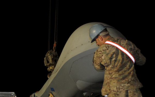 MQ-9 Airmen unload aircraft