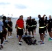 Headquarters and Headquarters Company, 10th Regional Support Group Soldiers enjoy a competitive day at the beach