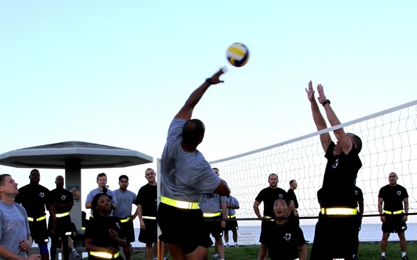 Headquarters and Headquarters Company, 10th Regional Support Group Soldiers enjoy a competitive day at the beach