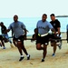 Headquarters and Headquarters Company, 10th Regional Support Group soldiers enjoy a competitive day at the beach