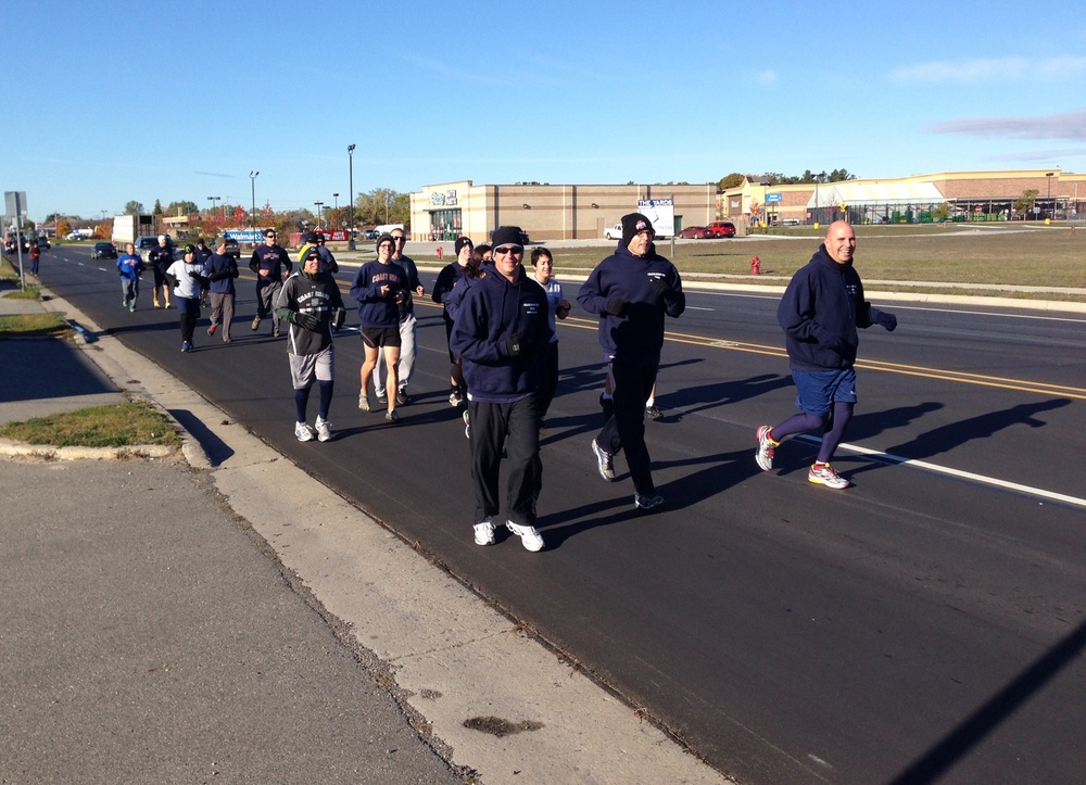 Coast Guardsmen run to raise food