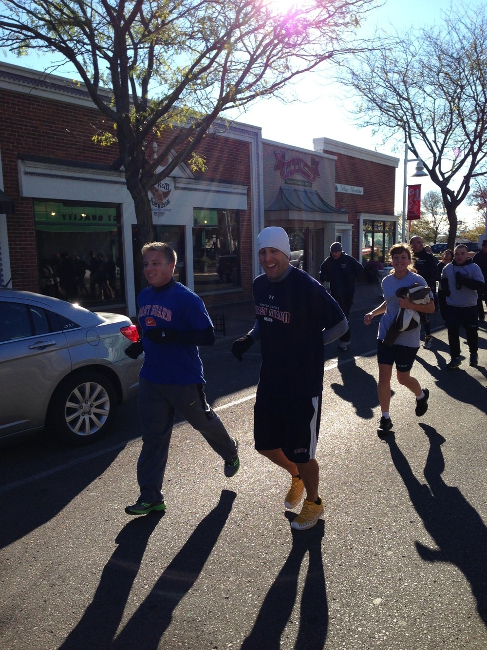 Coast Guardsmen run to raise food