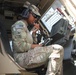 Signals NCO adjusts in Afghanistan