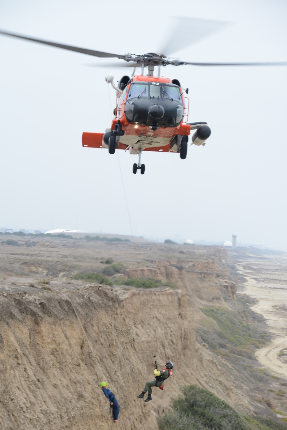 Coast Guard helicopter cliff rescue training