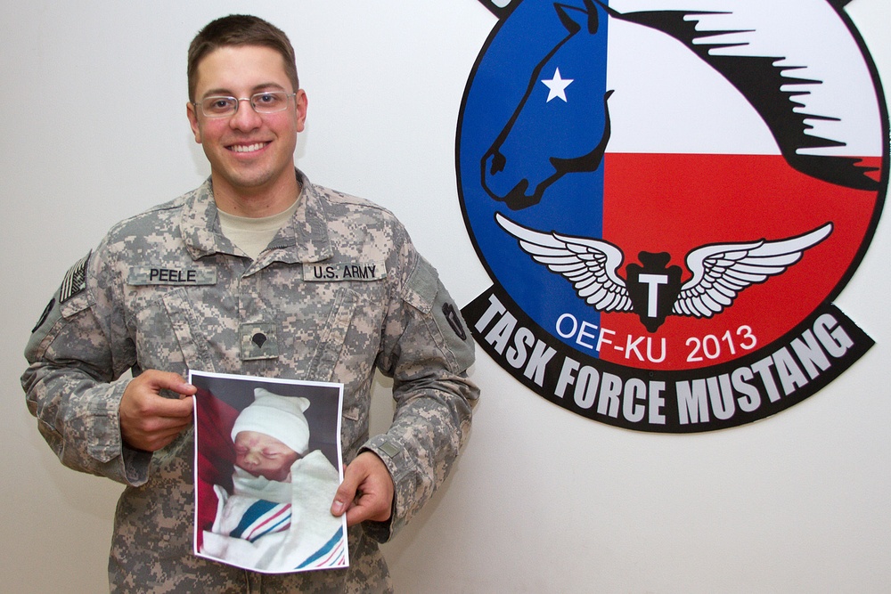 Wife of deployed soldier gives birth